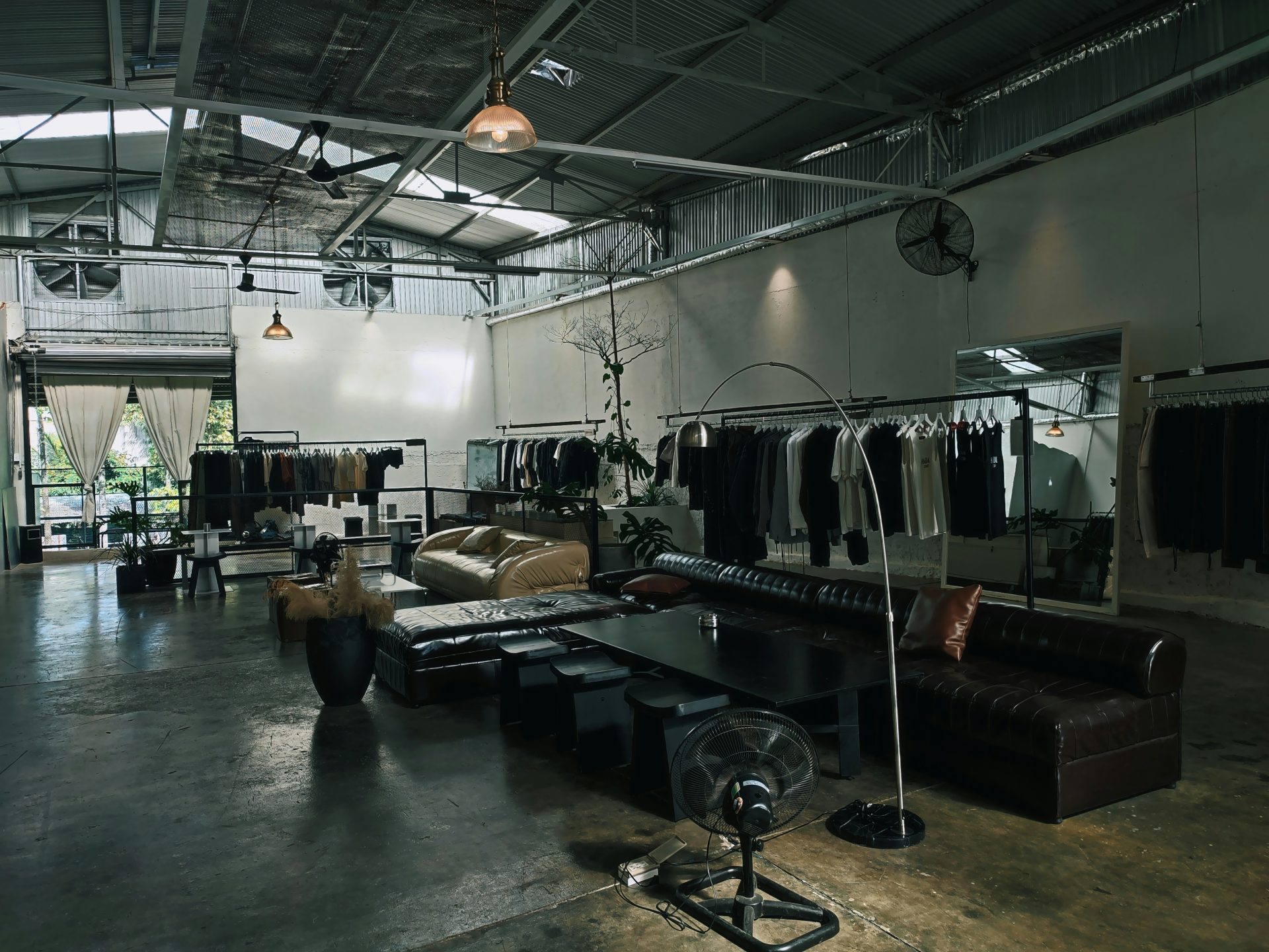 a large room with a couch and a table